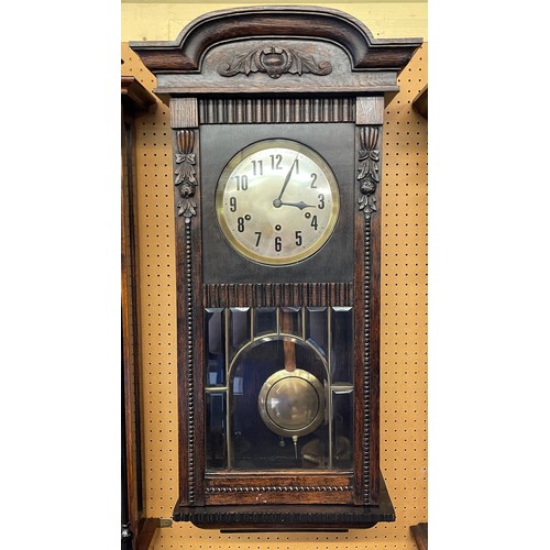 169 - EARLY 20TH CENTURY OAK CASED PENDULUM CHIMING WALL CLOCK WITH CARVED BEADED DECORATED CASE