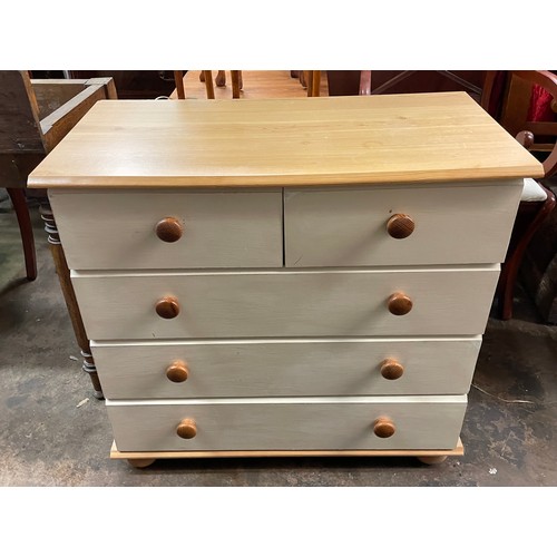 191 - PINE EFFECT AND CREAM FRONTED TWO OVER THREE DRAWER CHEST