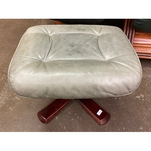 75 - STRESSLESS TYPE DARK GREEN LEATHER SWIVEL CHAIR AND FOOTSTOOL