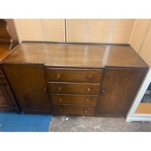 96 - UTILITY OAK DRAWER LEAF TABLE, FOUR CHAIRS, AND MATCHING BREAK FRONT SIDEBOARD