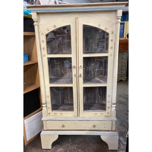 196 - GREEN WASH PAINTED GLAZED CABINET ON STAND