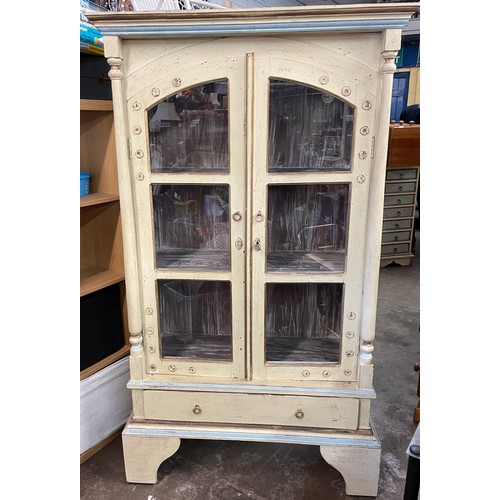 196 - GREEN WASH PAINTED GLAZED CABINET ON STAND