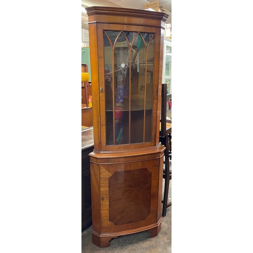 109 - REPRODUCTION MAHOGANY AND BURR WOOD ASTRAGAL CORNER CABINET