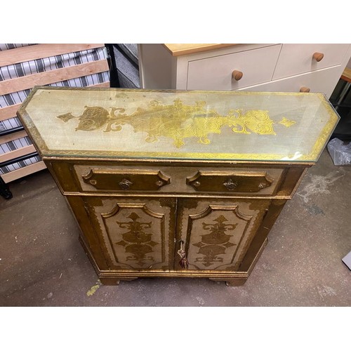 138 - ITALIAN GILT CANTED TWO DOOR CUPBOARD