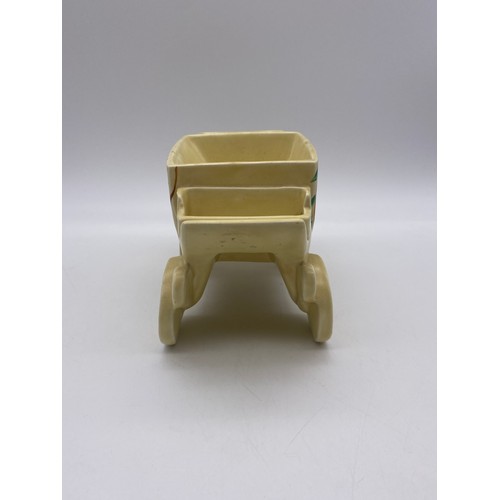 493 - CLARICE CLIFF DRYDAY NOVELTY CIGARETTE BOX MODELLED AS A HORSE DRAWN CARRIAGE (SANS COVER) H 11cm W ... 