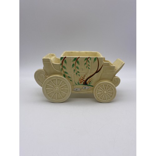 493 - CLARICE CLIFF DRYDAY NOVELTY CIGARETTE BOX MODELLED AS A HORSE DRAWN CARRIAGE (SANS COVER) H 11cm W ... 