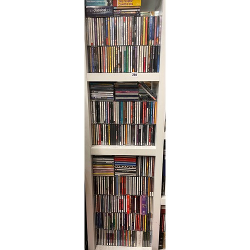 250 - SIX PIGEON HOLES OF VARIOUS CD MUSIC