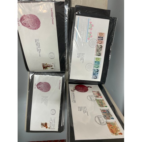 465 - TWO BINDERS OF POSTAGE STAMP FIRST DAY COVERS