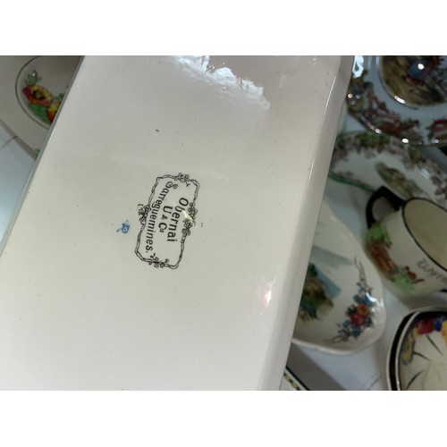 553 - SHELF OF FRENCH SARREGUEMINES, POTTERY TRAYS, ROYAL DOULTON GAFFERSWARE ITEMS AND DISHES