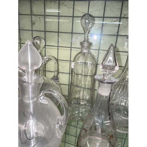 556 - RIBBED ETCHED CLARET JUG AND STOPPER, OTHER CLARET JUGS AND DECANTERS AND A COCKTAIL SHAKER