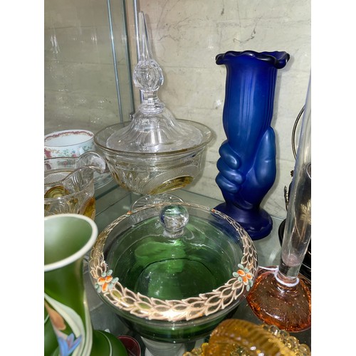 562 - SHELF OF ART NOUVEAU GREEN AND PAINTED SPILL VASES, AMBER GLASS BASKET, AMBER TINTED BOHEMIAN GLASSW... 