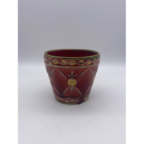 585 - MINTON LIMITED SECESSIONIST NUMBER 68 TAPERED VASE, NUMBER 42 SQUAT VASE A/F, AND A RED FLORAL PLANT... 