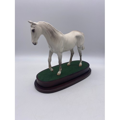 574 - ROYAL DOULTON DESERT ORCHID MATT FIGURE ON PLINTH