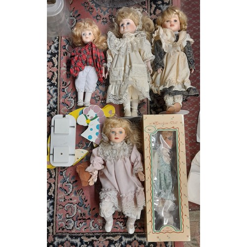 623 - FIVE BOXED PORCELAIN HEADED DOLLS