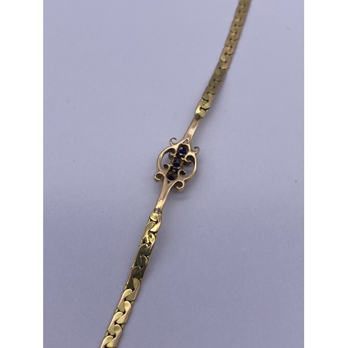 520 - 9CT GOLD THREE STONE BRACELET 4.4G APPROX