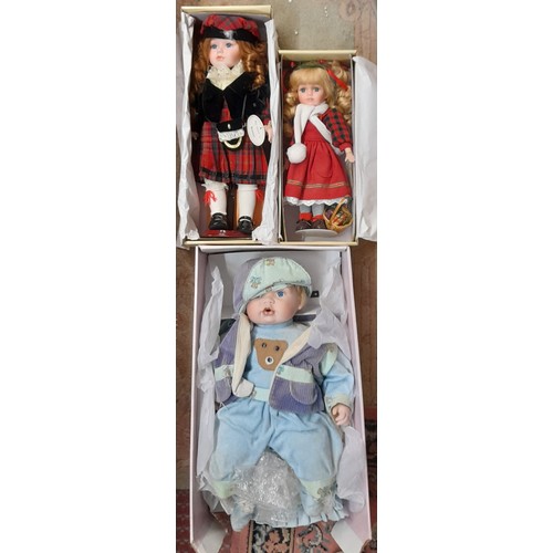 627 - TWO LEONARDO COLLECTION ELITE RANGE BISQUE HEADED DOLLS AND LEONARDO PORCELAIN BABY DOLL