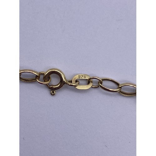 524 - 9CT GOLD LINK BRACELET WITH DIAMANTE HEART CHARM 2G APPROX