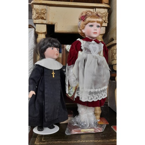 620 - TWO PORCELAIN HEADED DOLLS CHERIE, AND A NUN