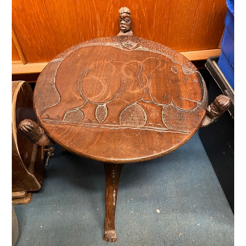 48 - CARVED AFRICAN HARD WOOD TABLE ON FOLDING STAND