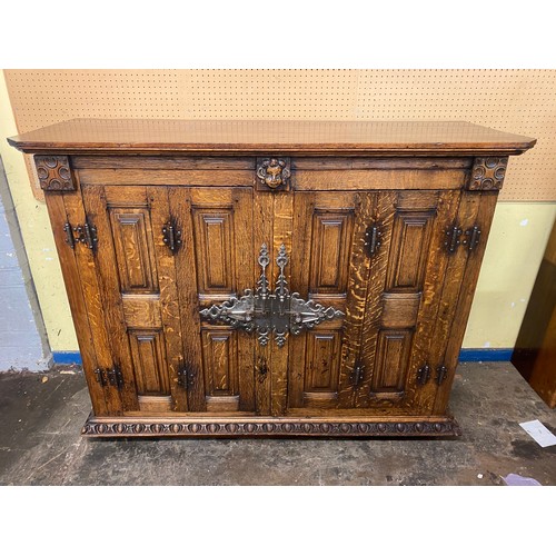 132 - 19TH CENTURY OAK BLOCK PANELLED FRONT CABINET WITH GERMAN STYLE IRON WORK LOCK