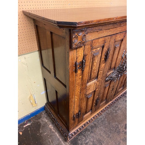 132 - 19TH CENTURY OAK BLOCK PANELLED FRONT CABINET WITH GERMAN STYLE IRON WORK LOCK