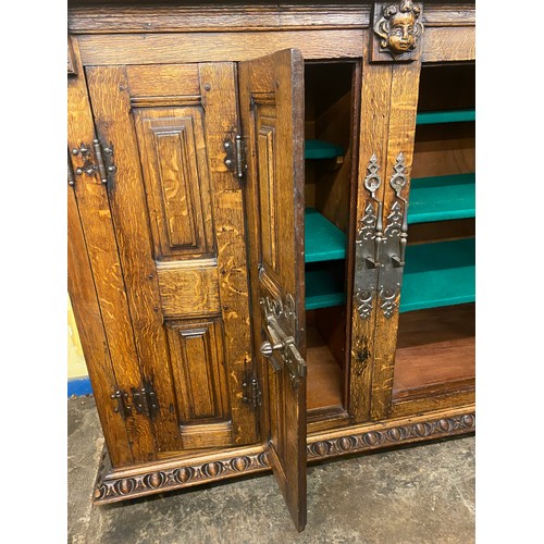 132 - 19TH CENTURY OAK BLOCK PANELLED FRONT CABINET WITH GERMAN STYLE IRON WORK LOCK