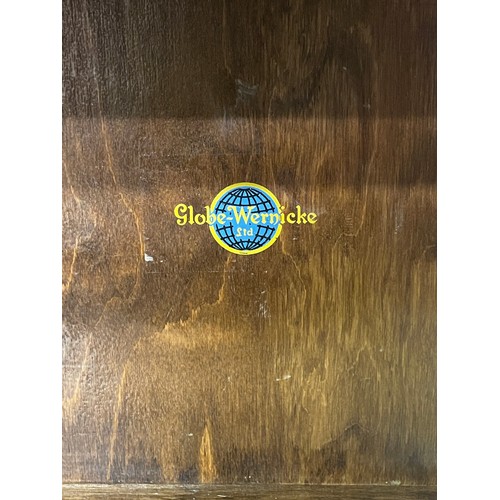 133 - GLOBE WERNICKE OAK STEPPED FOUR SECTION BOOKCASE WITH TRANSFER PRINTED TRADE MARK