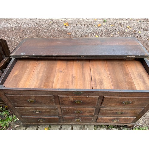 112 - 18TH CENTURY OAK NINE DRAWER MULE CHEST ON BRACKET FEET