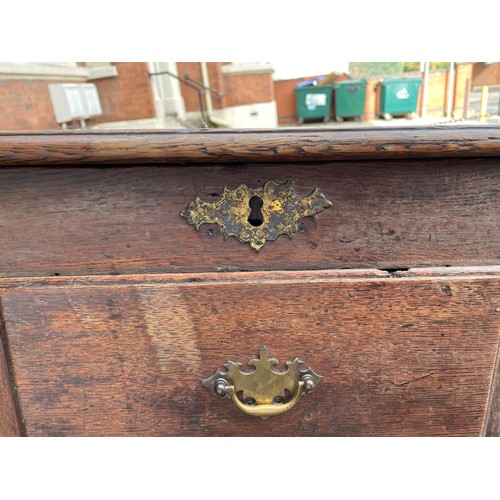 112 - 18TH CENTURY OAK NINE DRAWER MULE CHEST ON BRACKET FEET