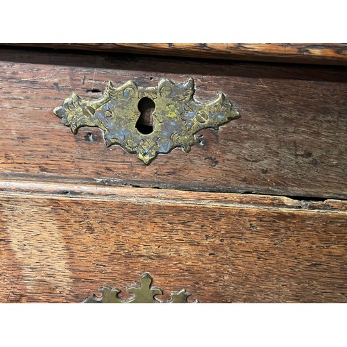 112 - 18TH CENTURY OAK NINE DRAWER MULE CHEST ON BRACKET FEET