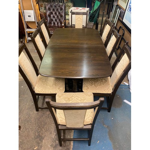 35 - DARK ELM ERCOL REFECTORY DINING TABLE AND SIX UPHOLSTERED DINING CHAIRS