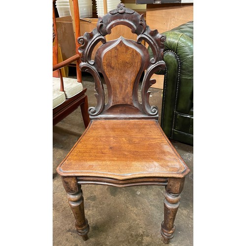 63 - VICTORIAN CARVED CARTOUCHE SHAPED BACK MAHOGANY HALL CHAIR