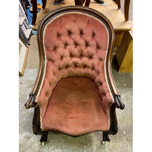 84 - VICTORIAN CARVED WALNUT FRAMED BUTTON BACK UPHOLSTERED GENTLEMANS SCROLL ARMCHAIR AND MATCHING NURSI... 