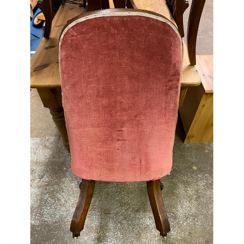 84 - VICTORIAN CARVED WALNUT FRAMED BUTTON BACK UPHOLSTERED GENTLEMANS SCROLL ARMCHAIR AND MATCHING NURSI... 