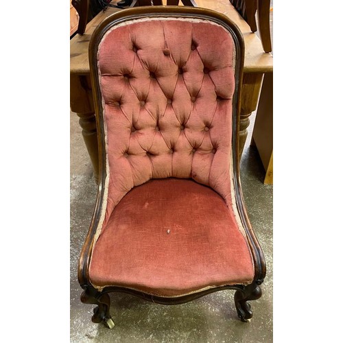 84 - VICTORIAN CARVED WALNUT FRAMED BUTTON BACK UPHOLSTERED GENTLEMANS SCROLL ARMCHAIR AND MATCHING NURSI... 