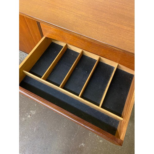 135 - 1960S TEAK LONG SIDEBOARD (POSSIBLY BRITISH DESIGN)