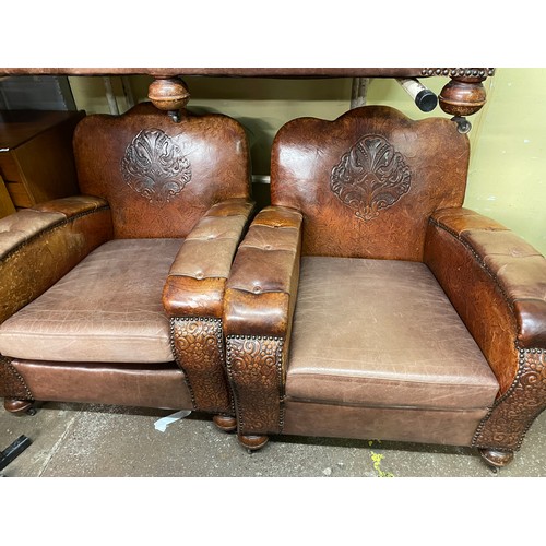 136 - 20TH CENTURY TAN EMBOSSED LEATHER UPHOLSTERED THREE PIECE SUITE