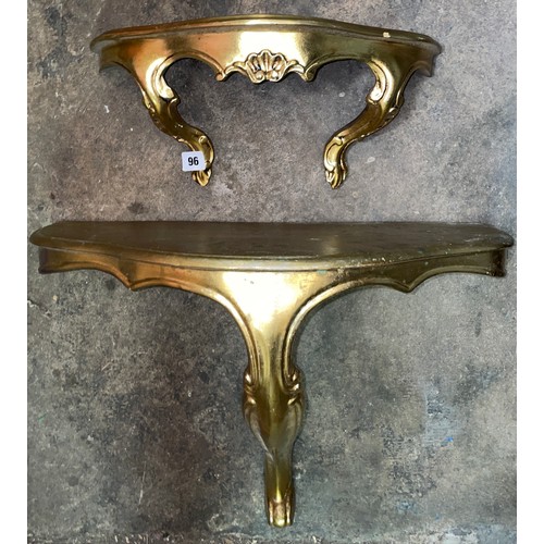 96 - TWO GILT SERPENTINE WALL MOUNTED CONSOLE SHELVES