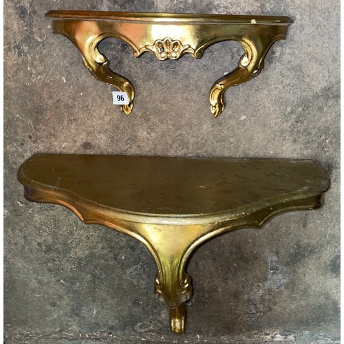 96 - TWO GILT SERPENTINE WALL MOUNTED CONSOLE SHELVES