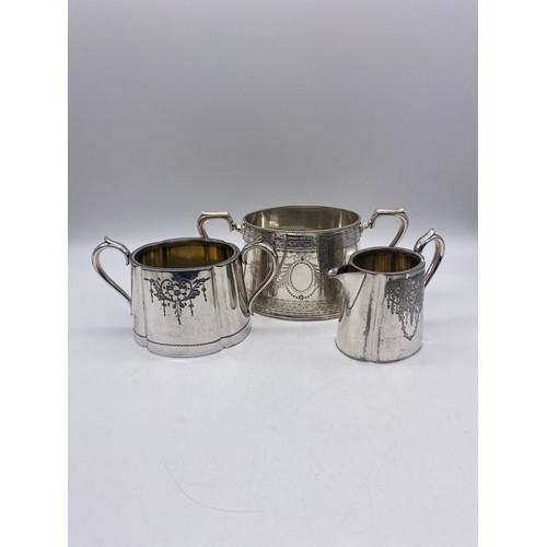 260 - VICTORIAN AND ELECTROPLATED ENGRAVED FOUR PIECE TEASET AND A LATER HOT WATER JUG