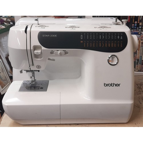 311 - BROTHER ELECTRIC SEWING MACHINE WITH MANUAL