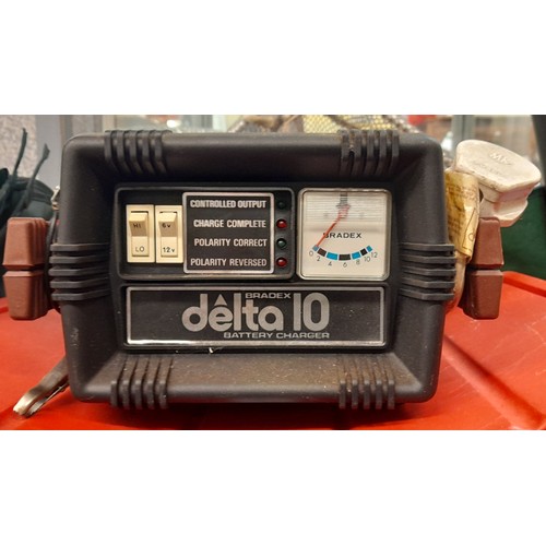 331 - DELTA 10 BATTERY CHARGER AND SMALL TOOL KIT