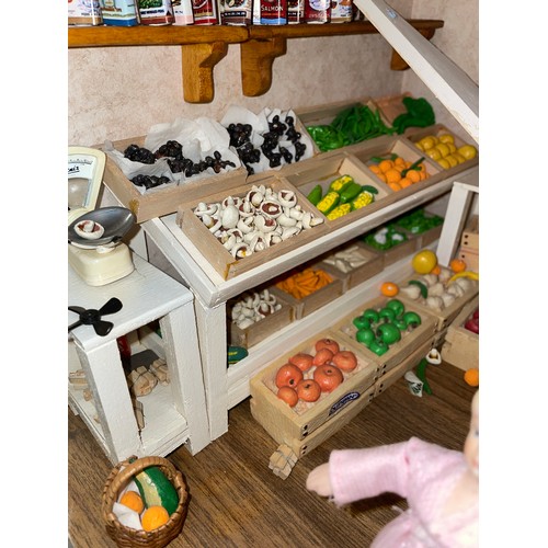 128 - TOWN HOUSE STYLE DOLLS HOUSE AND CONTENTS