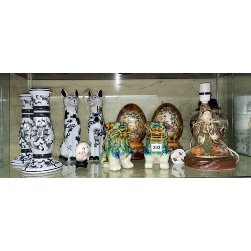 303 - SHELF OF REPRODUCTION CHINESE INSPIRED TEMPLE VASE AND COVER, FOO DOGS, AND DECORATIVE WARES