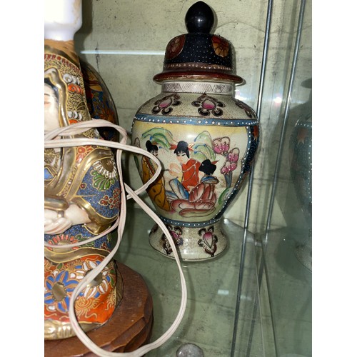 303 - SHELF OF REPRODUCTION CHINESE INSPIRED TEMPLE VASE AND COVER, FOO DOGS, AND DECORATIVE WARES