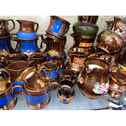 306 - SHELF OF 19TH CENTURY COPPER LUSTRE RESIST AND ENAMELLED SPARROW BEAK JUGS, GOBLETS