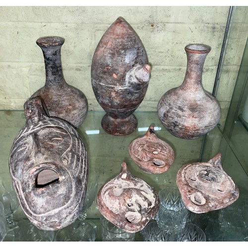 305 - HALF SHELF OF ARCHAIC POTTERY, ROMAN STYLE OIL LAMPS AND VASES