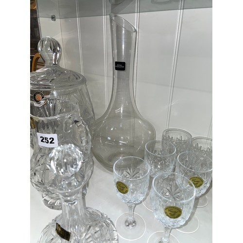 252 - SHELF OF ELIZABETH AND IRENA GLASSWARE INCLUDING BISCUIT BARREL, BOWLS, JUGS