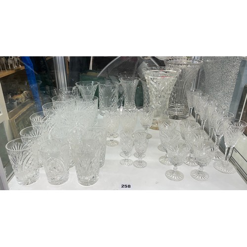 258 - SHELF OF GOOD QUALITY CUT GLASS TUMBLERS, WAISTED VASES, AND SHERRY GLASSES