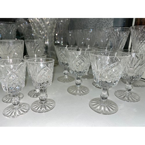 258 - SHELF OF GOOD QUALITY CUT GLASS TUMBLERS, WAISTED VASES, AND SHERRY GLASSES